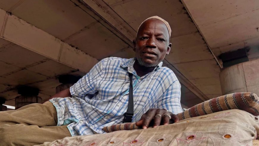 Living Under Lagos' Obalende Bridge: The Story of a Guardian and His Homeless Community